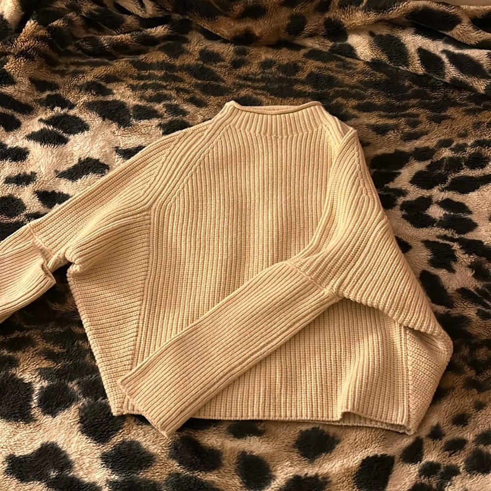 This is acrylic sweater from ZARA , S size or 26 feels soft and comfortable.